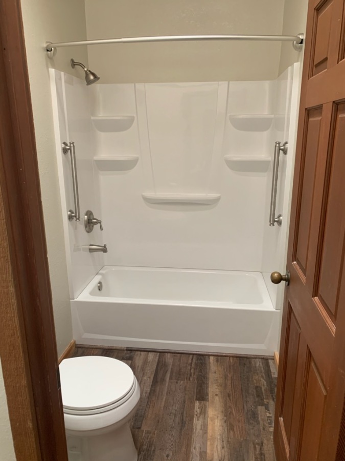 Acrylic Tub Surround with ADA grab bars on either side